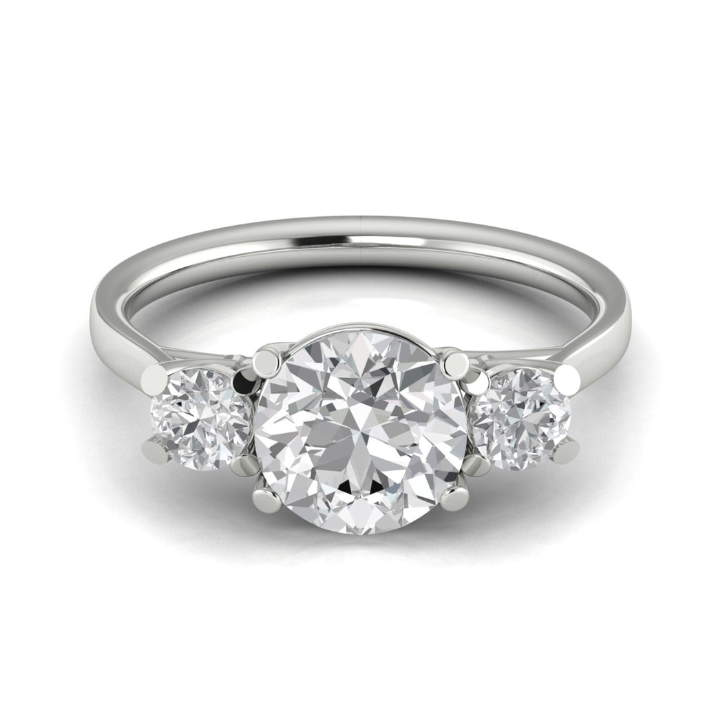 Anillo de compromiso tres piedras redondo