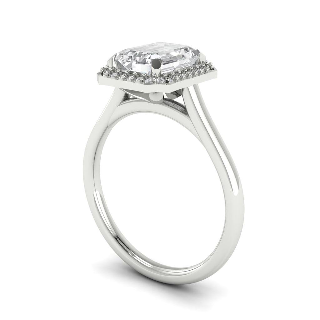 Anillo de compromiso halo corte esmeralda