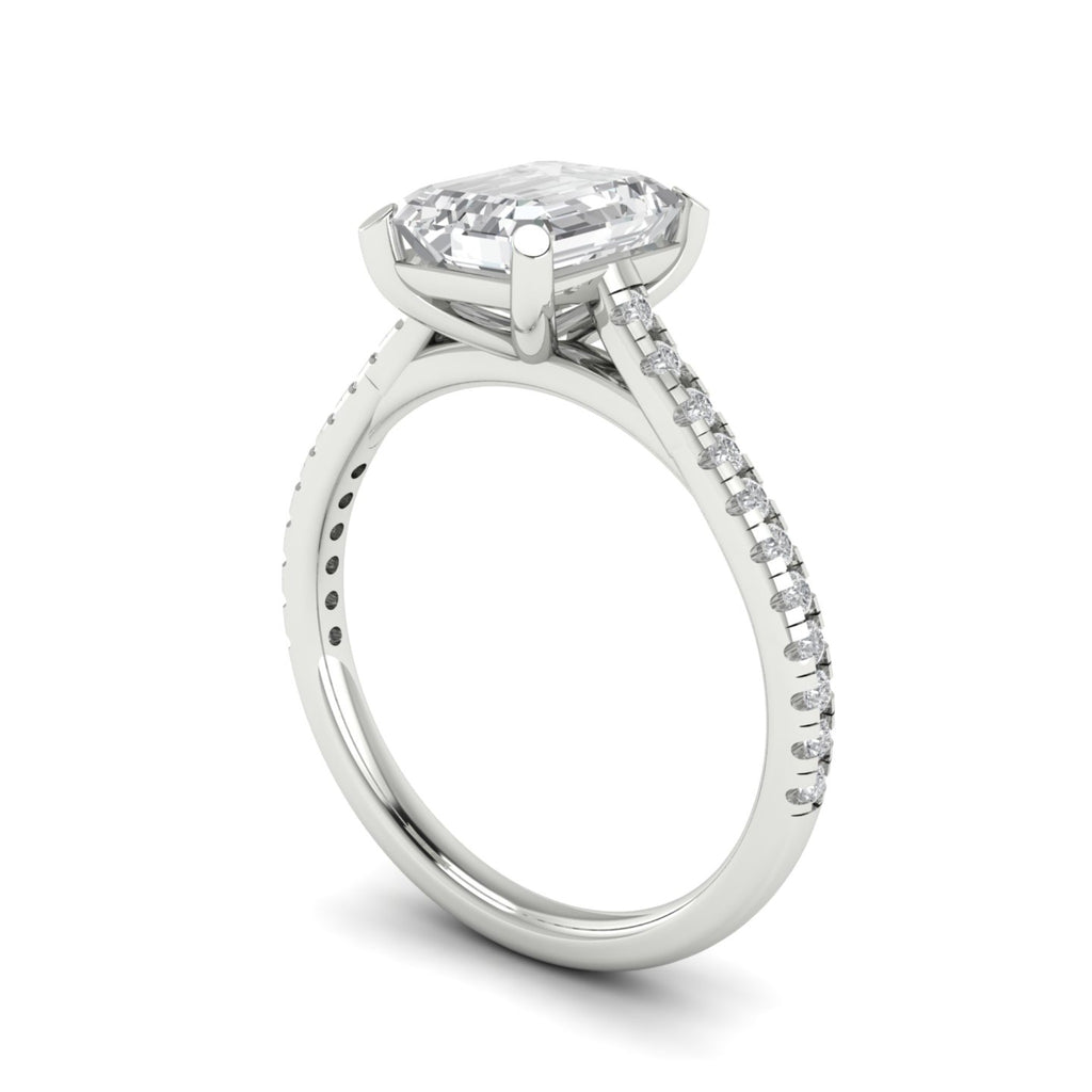 Anillo de compromiso solitario corte esmeralda pave