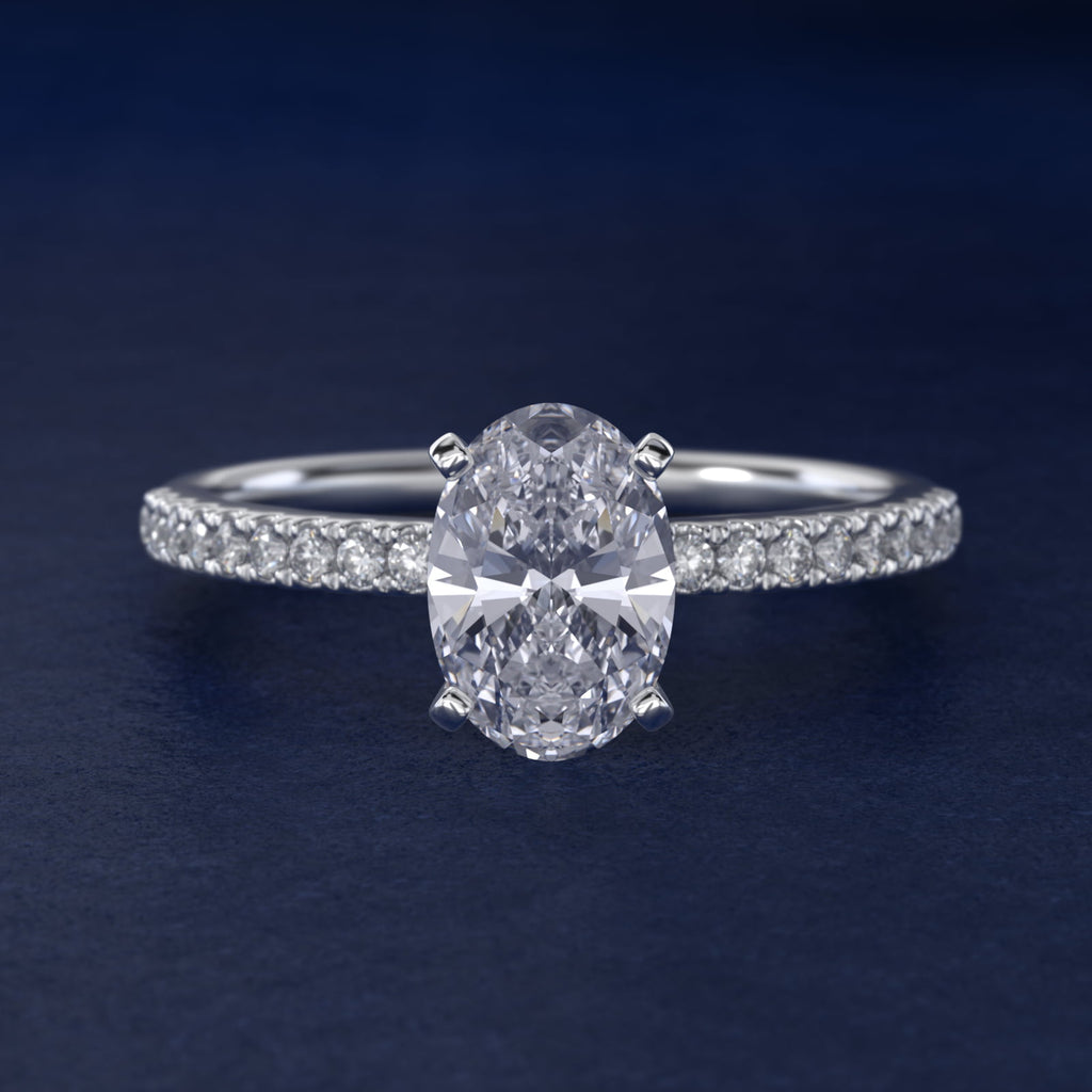Anillo de compromiso solitario oval pave
