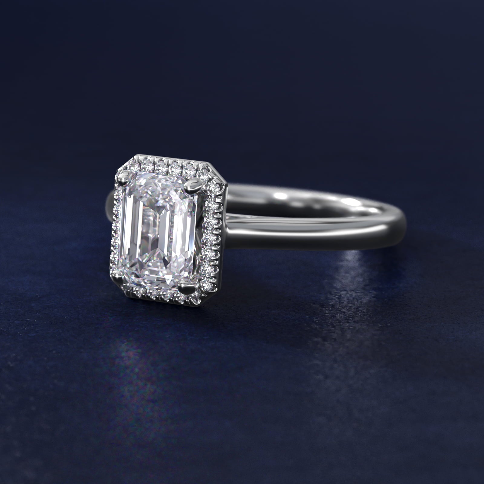 Anillo de compromiso halo corte esmeralda