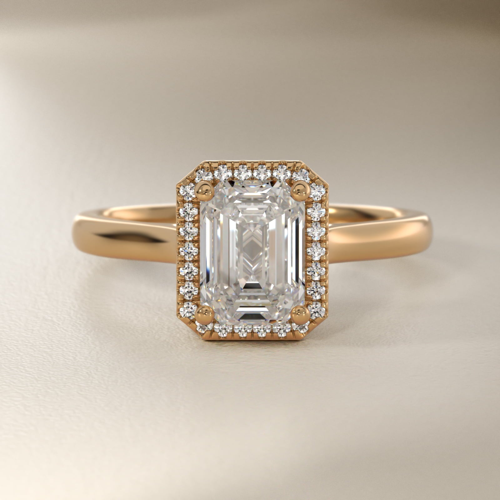 Anillo de compromiso Halo corte esmeralda