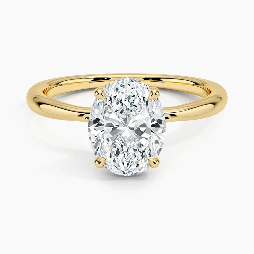 Anillo de compromiso solitario oval en oro amarillo, Joyería Bruzzone