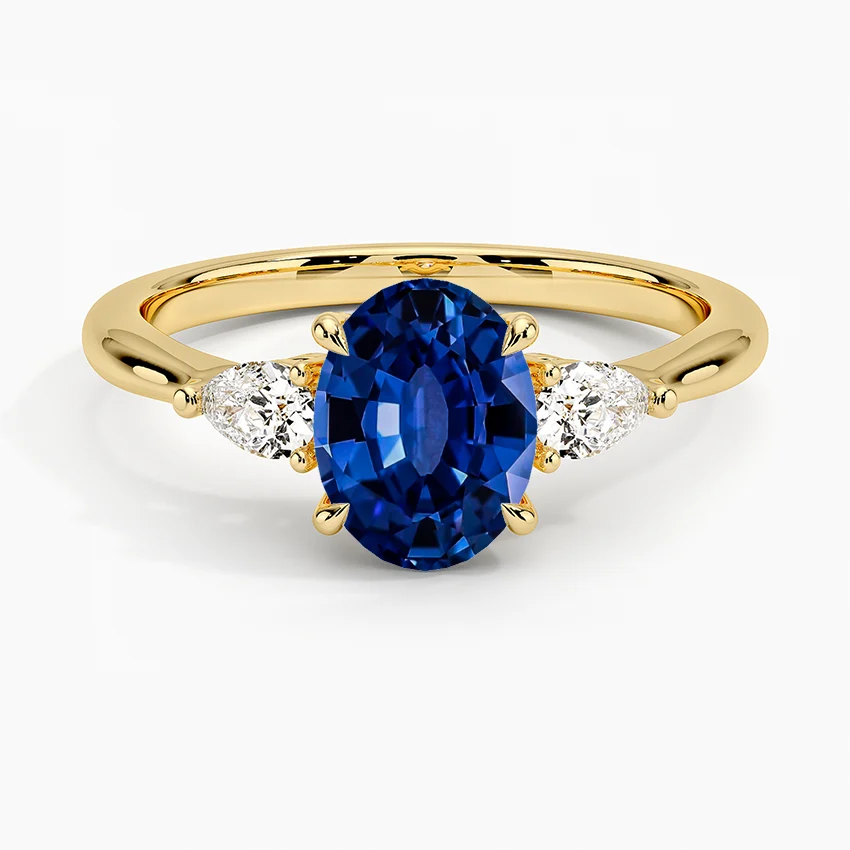 Anillo de compromiso zafiro ovalado tres piedras oro