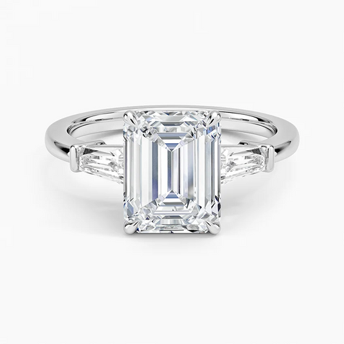 Anillo de compromiso tres piedras, con esmeralda, Joyería Bruzzone