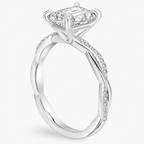 Anillo de compromiso solitario esmeralda pave infinito oro blanco
