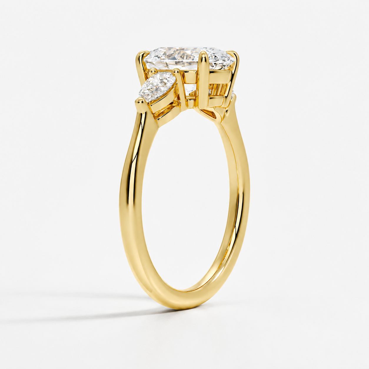 Anillo de compromiso tres piedras gota Florencia Oro amarillo
