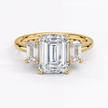 Anillo de compromiso tres piedras, con esmeralda, Joyería Bruzzone