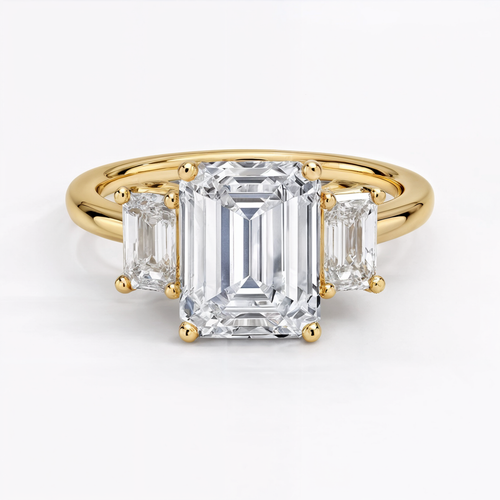 Anillo de compromiso tres piedras, con esmeralda, Joyería Bruzzone