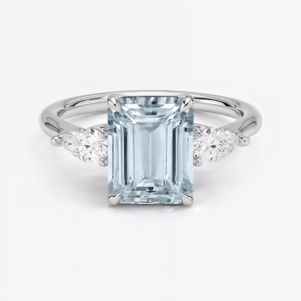Anillo de compromiso aguamarina corte esmeralda tres piedras