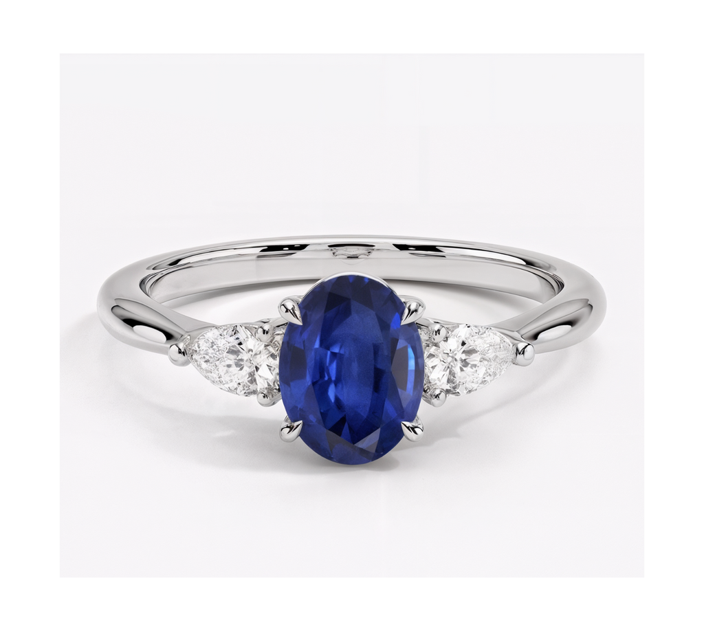 Anillo de compromiso zafiro ovalado tres piedras