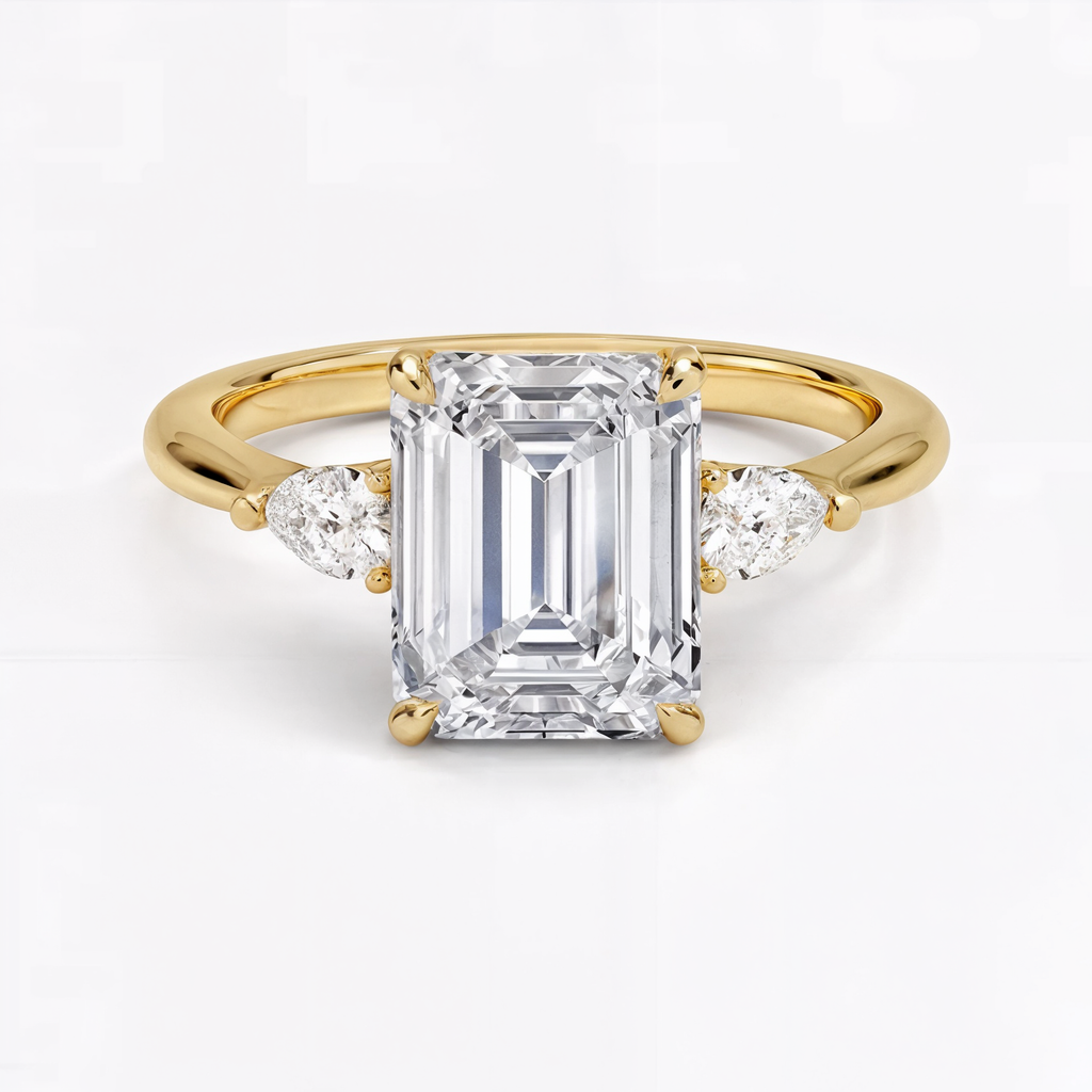 Anillo de compromiso tres piedras esmeralda